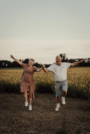 a man and woman jumping in the air
