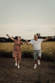 a man and woman jumping in the air
