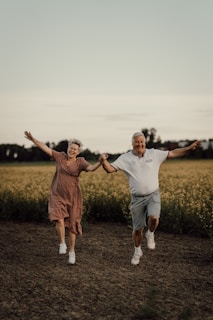 a man and woman jumping in the air