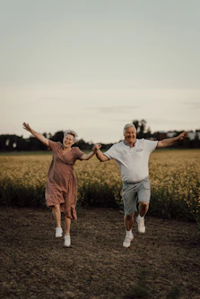 a man and woman jumping in the air