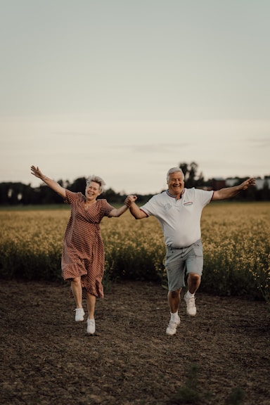 a man and woman jumping in the air