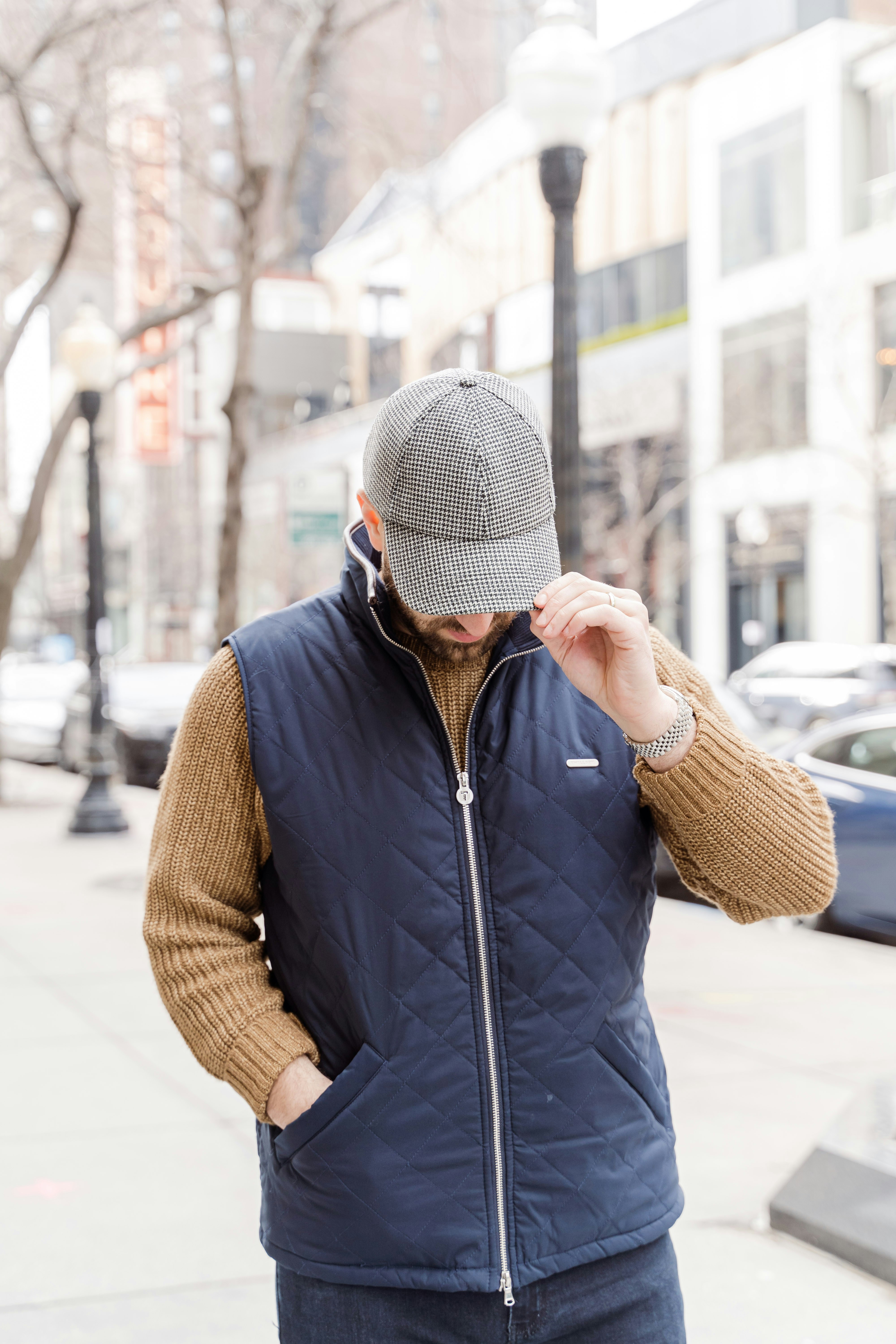 A person wearing a hat and jacket photo – Free Human Image on Unsplash