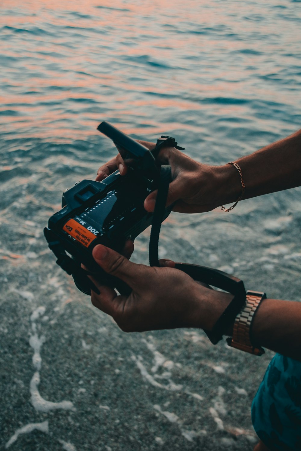 a person holding a camera