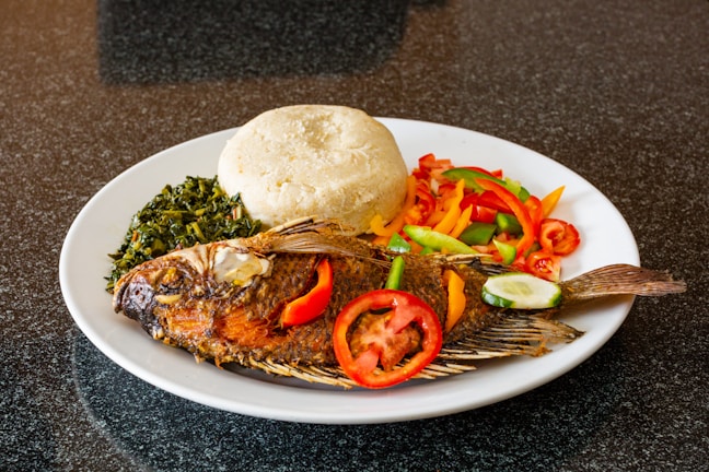 A beautifully plated traditional Zambian dish showcasing vibrant colors.