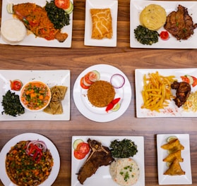 Plated authentic African dishes ready for catering service.