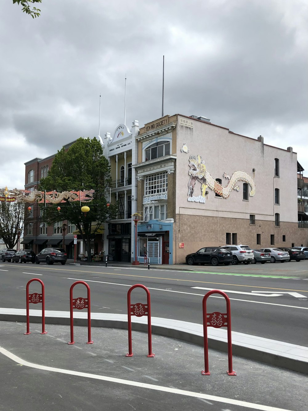 a street with cars parked on the side