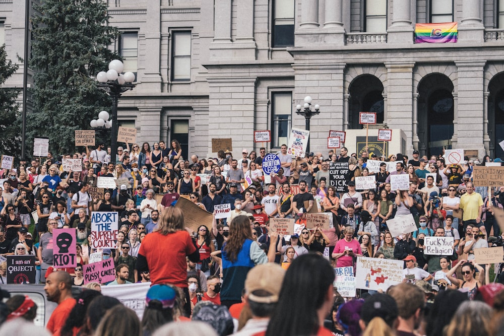 a large crowd of people outside a building