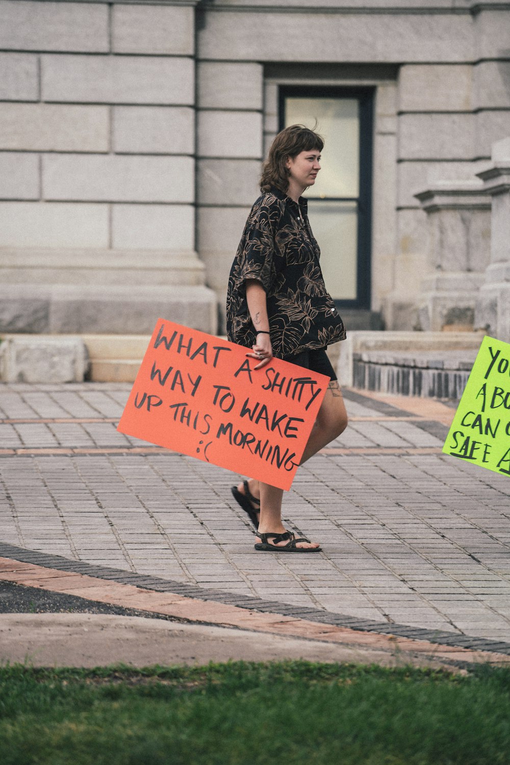 a person holding a sign