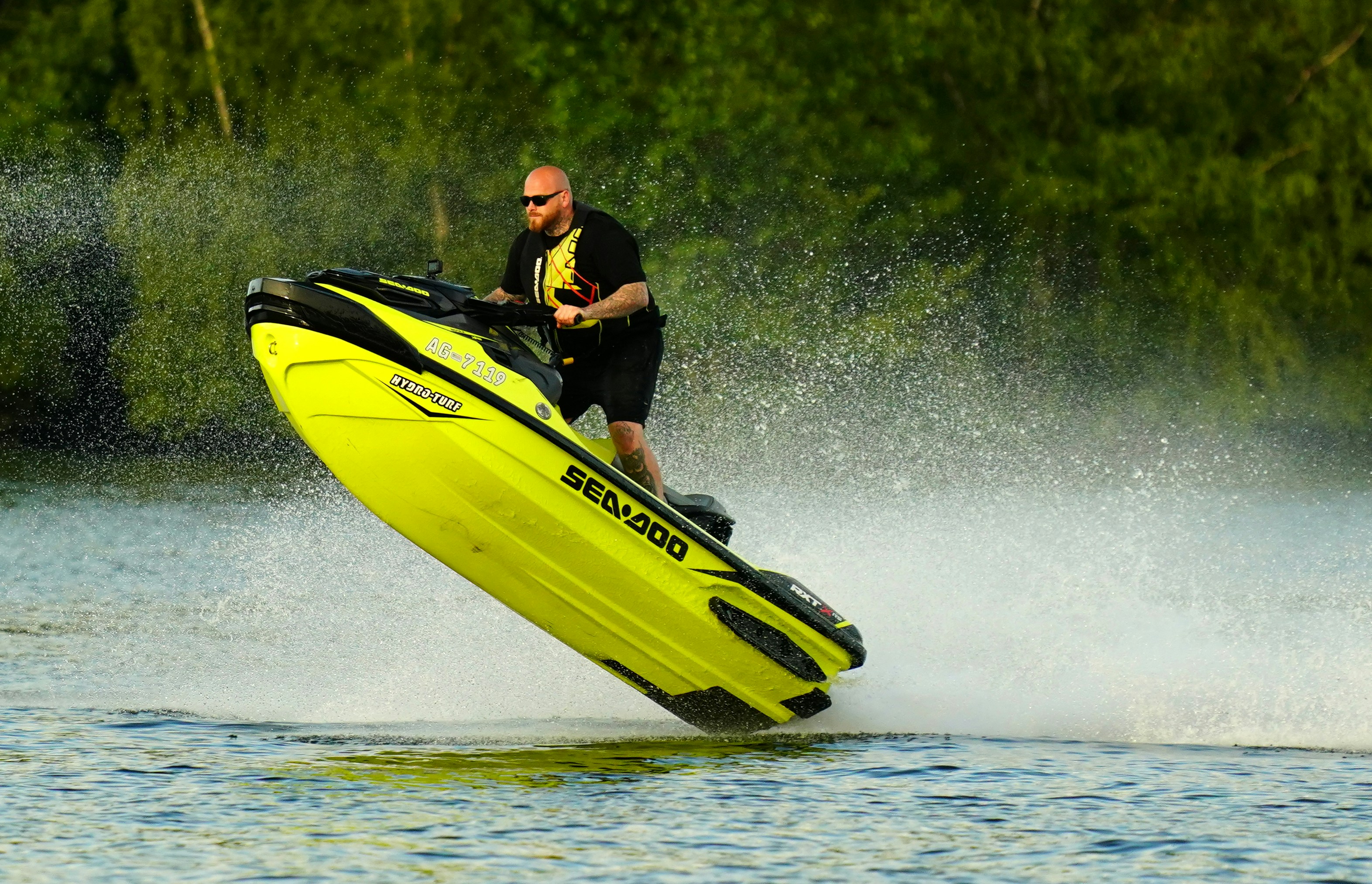 A man riding a jet ski photo – Free Human Image on Unsplash