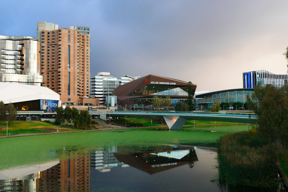 a body of water with buildings around it