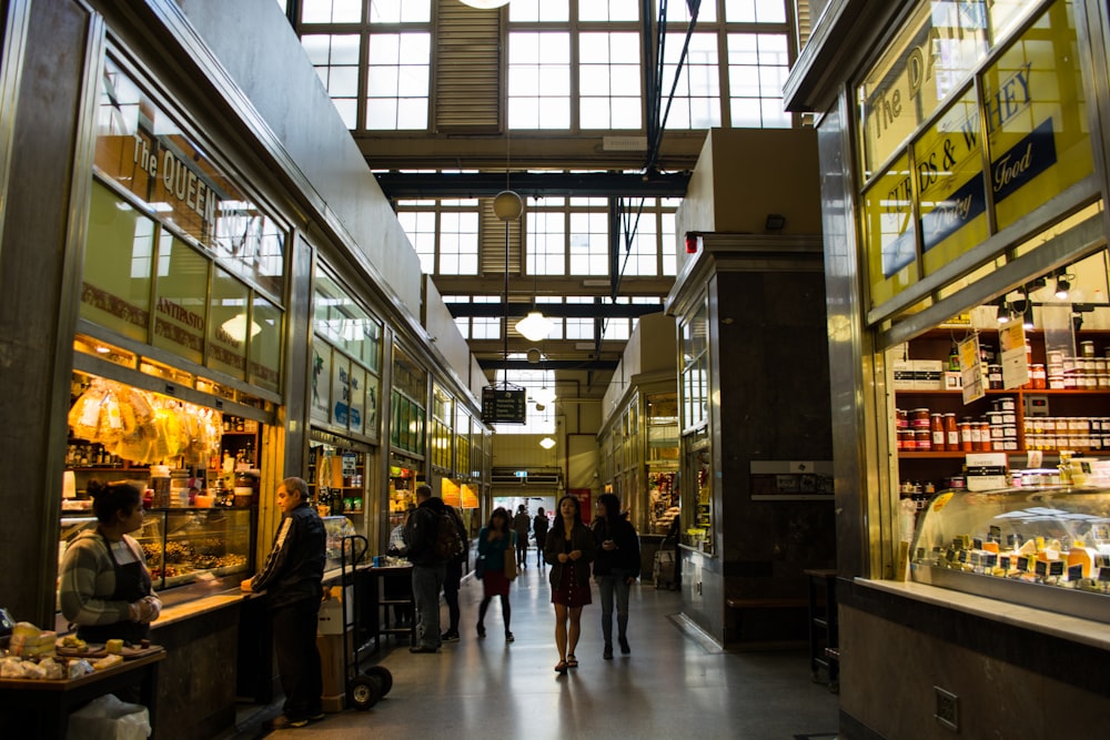 people walking in a large building