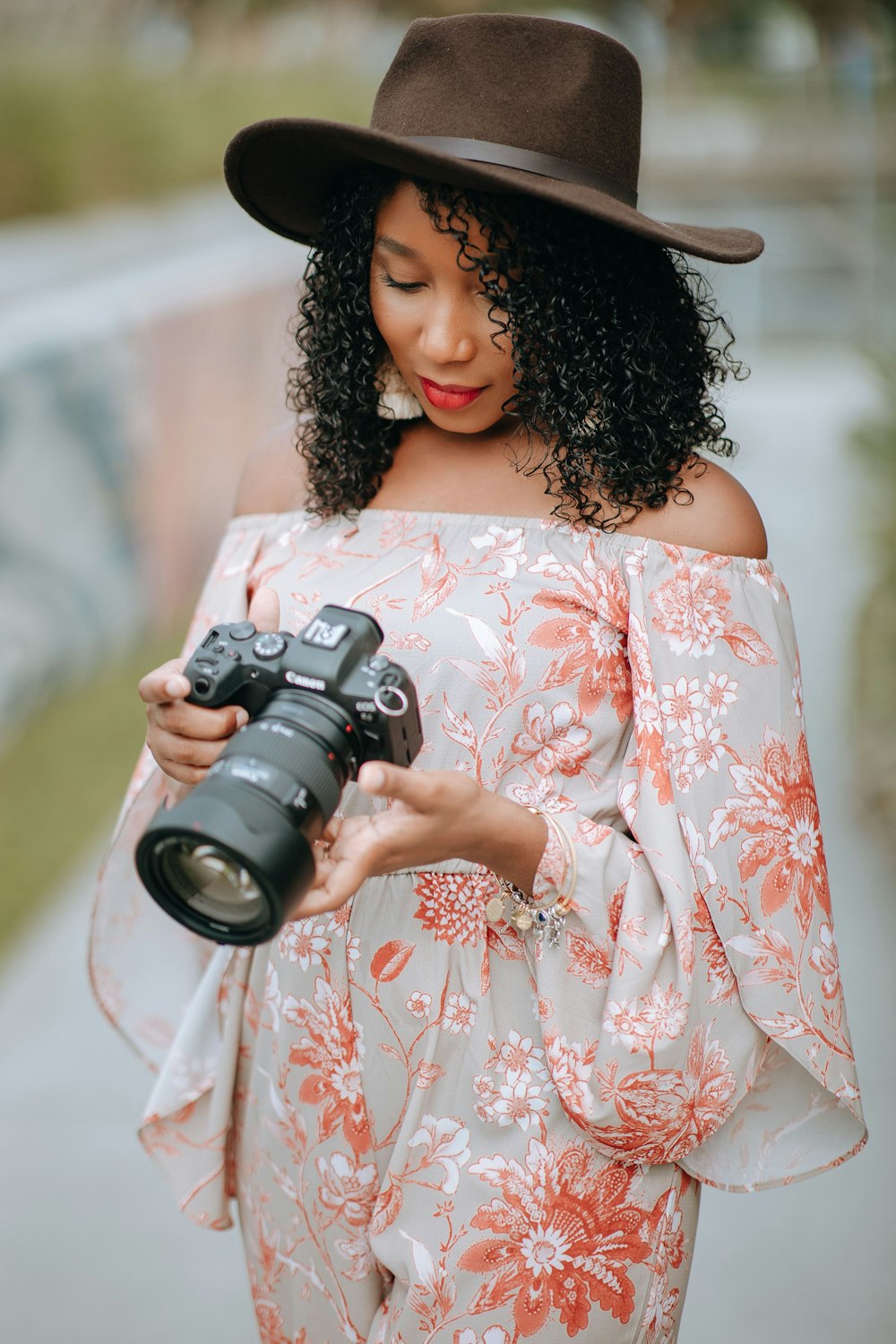 a person holding a camera