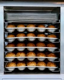 a group of pastries in a fridge