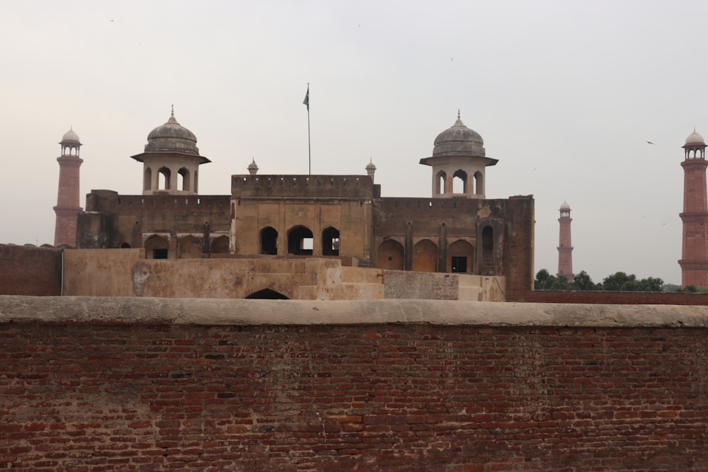 a large building with a brick wall