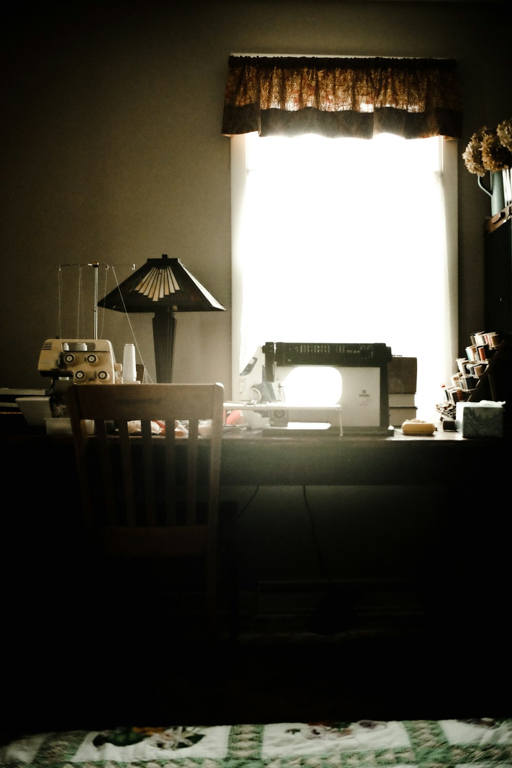 a room with a table and chairs