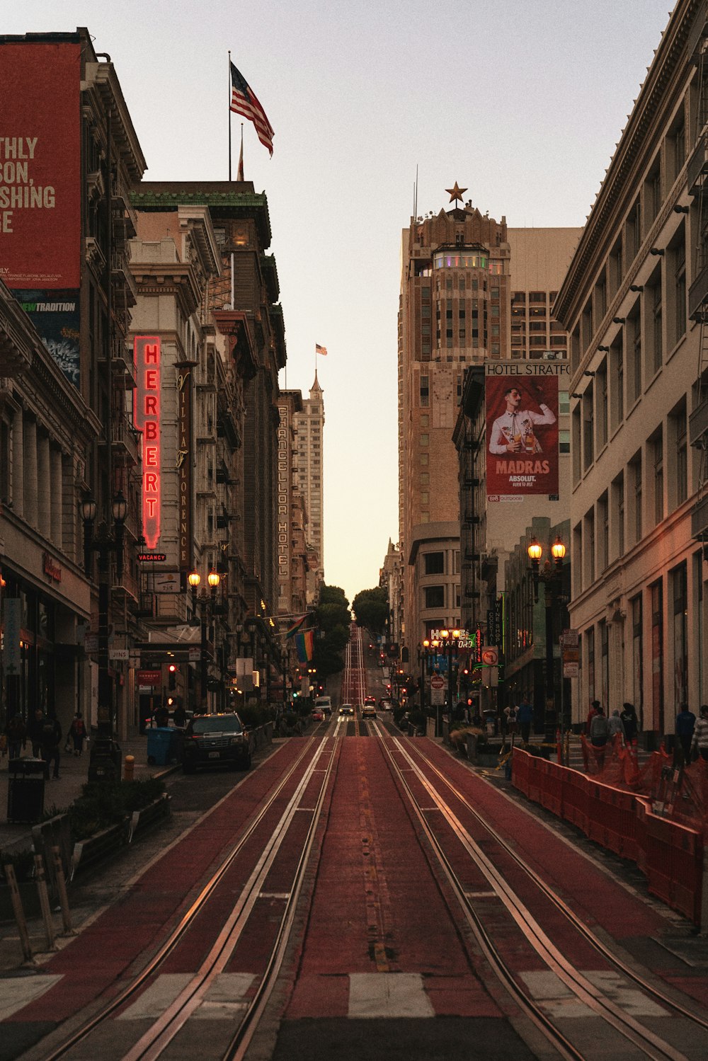 a city street with buildings and cars