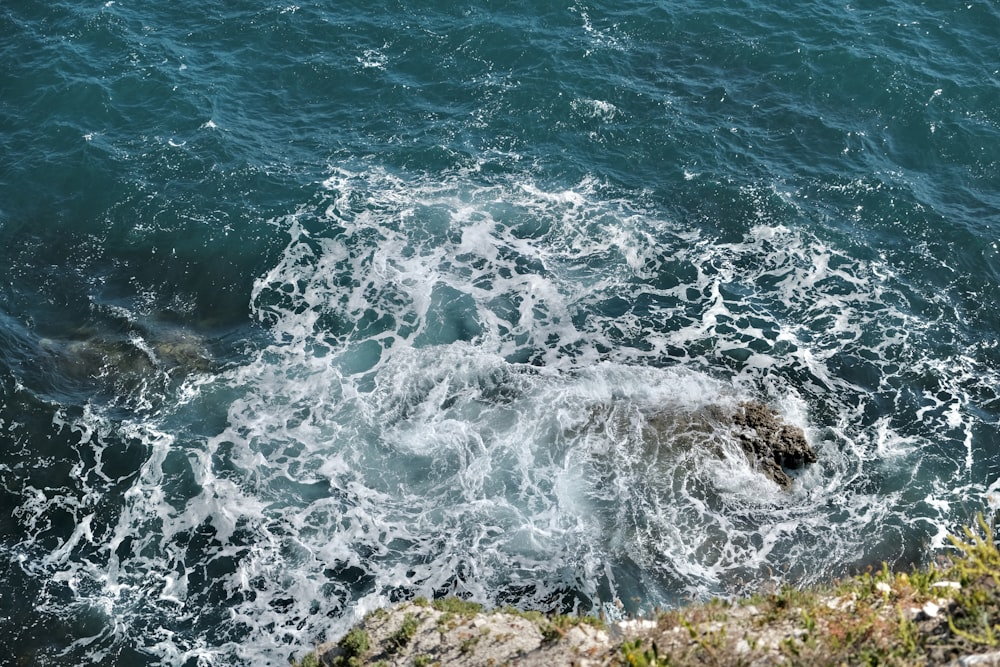 waves crashing on rocks