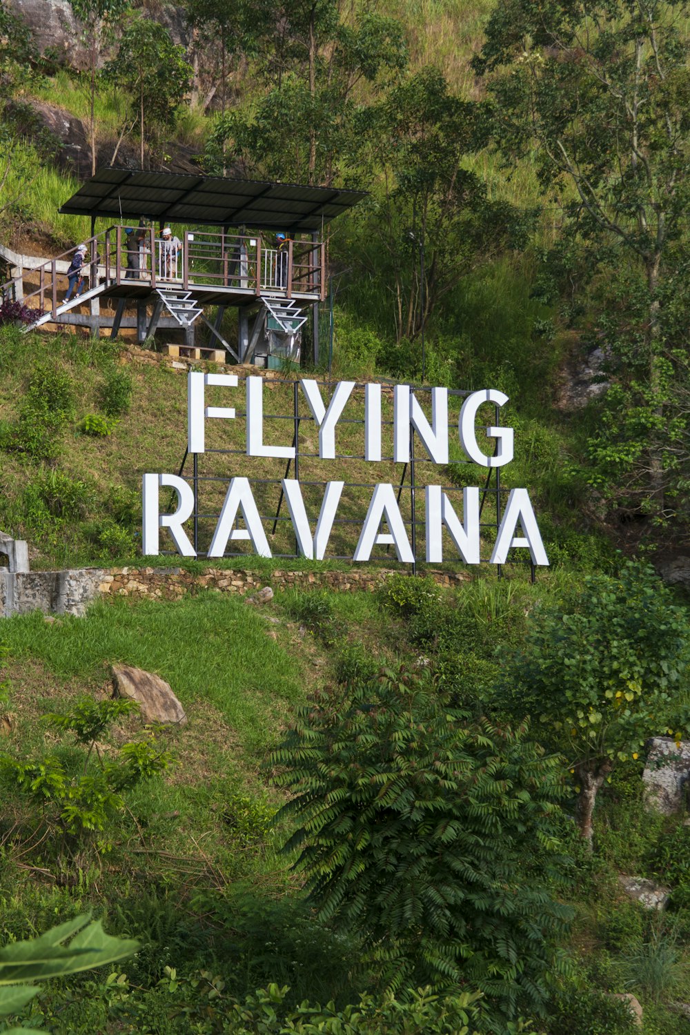 a sign in front of a building