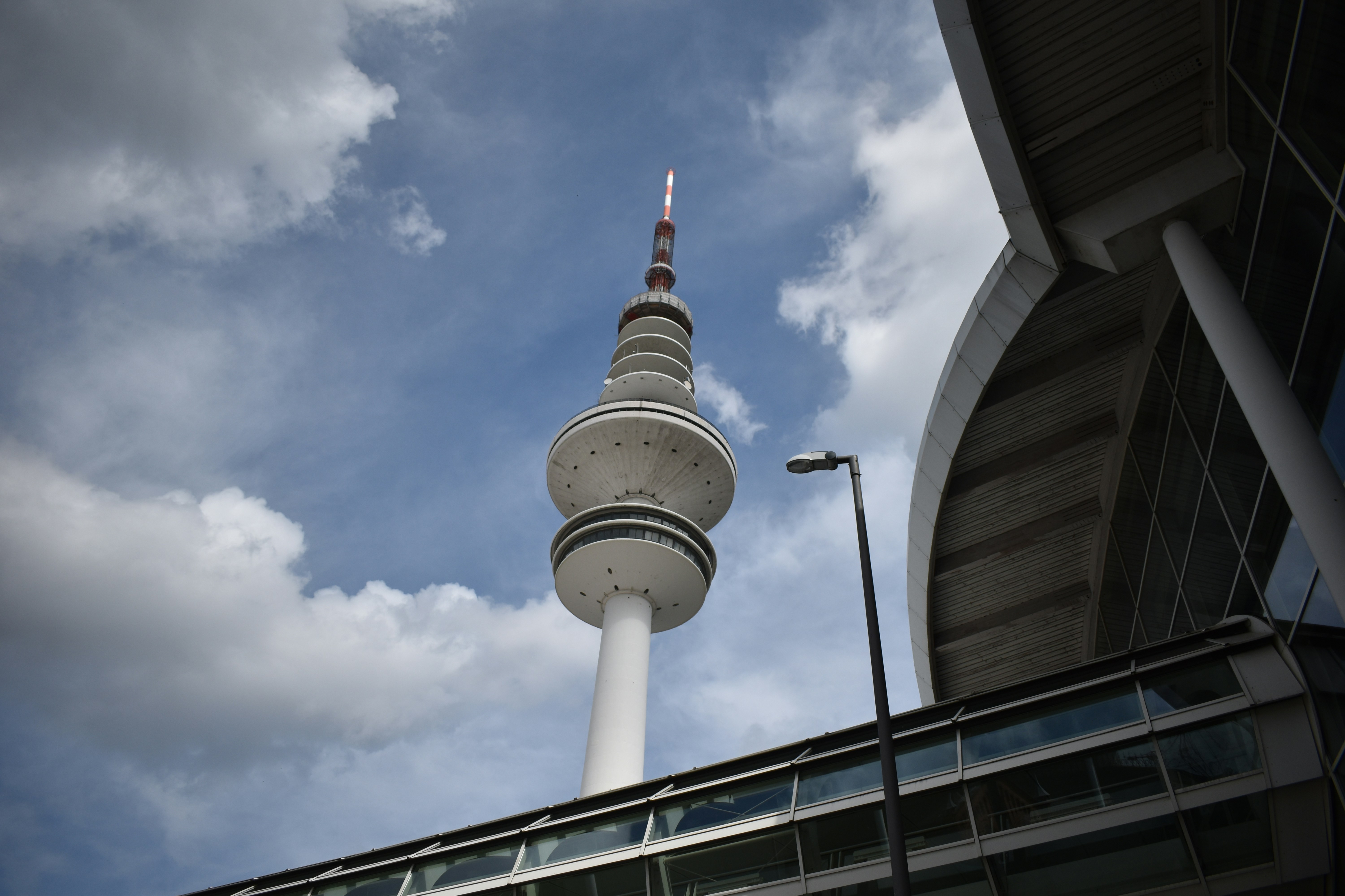 a tall tower with a flag on top