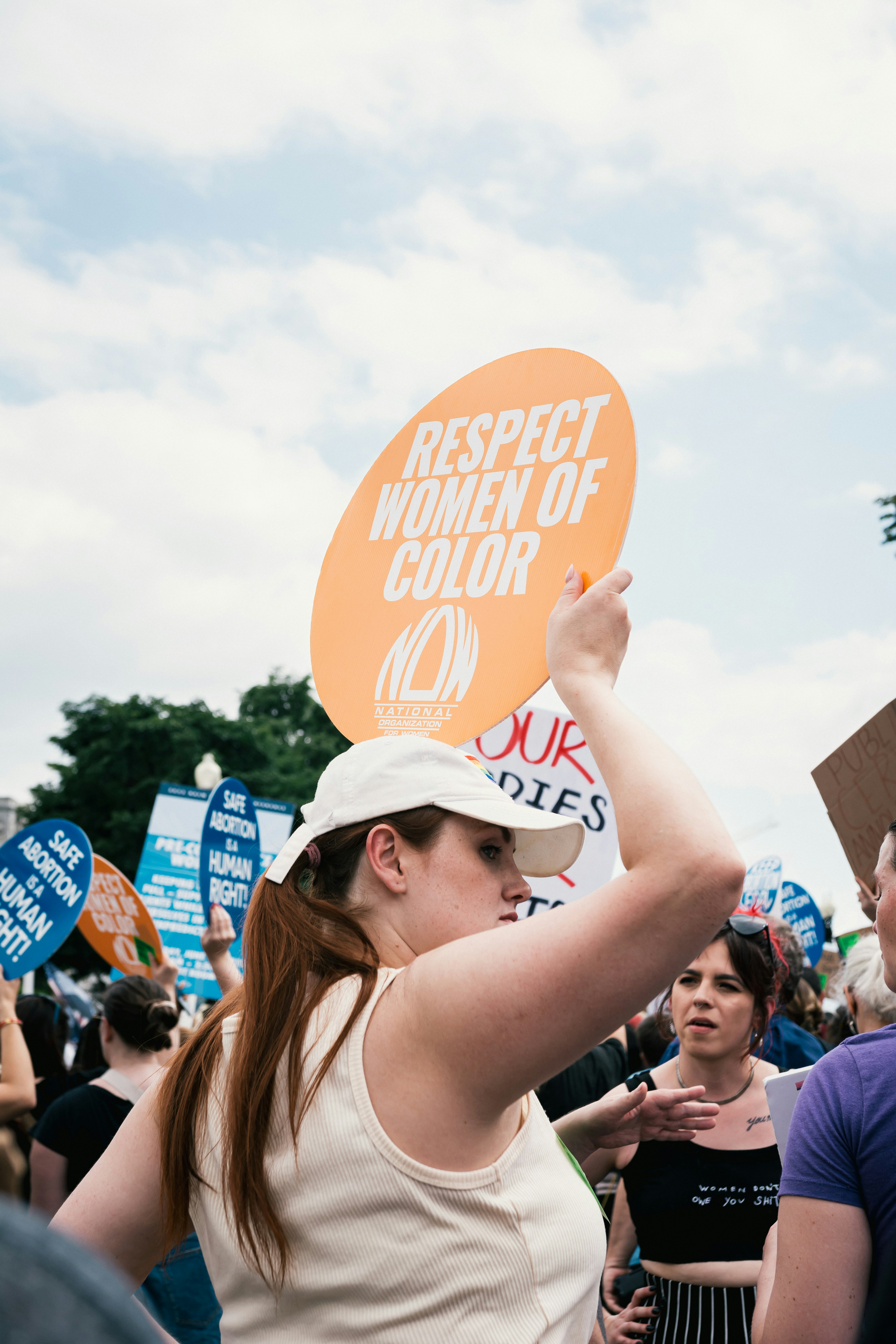 a person holding a sign