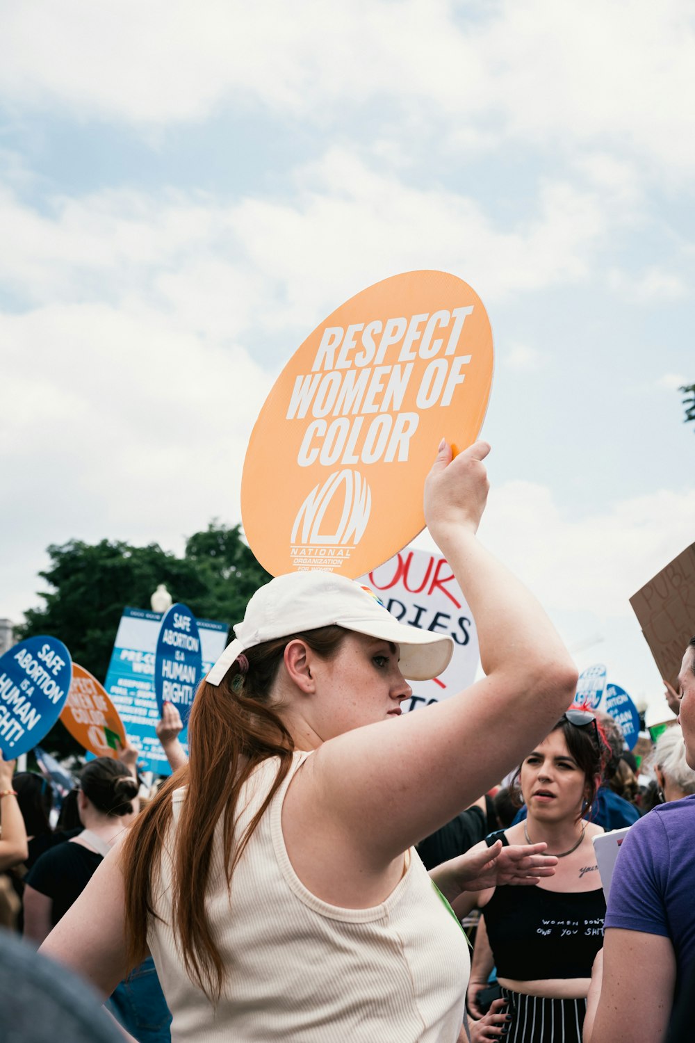 a person holding a sign