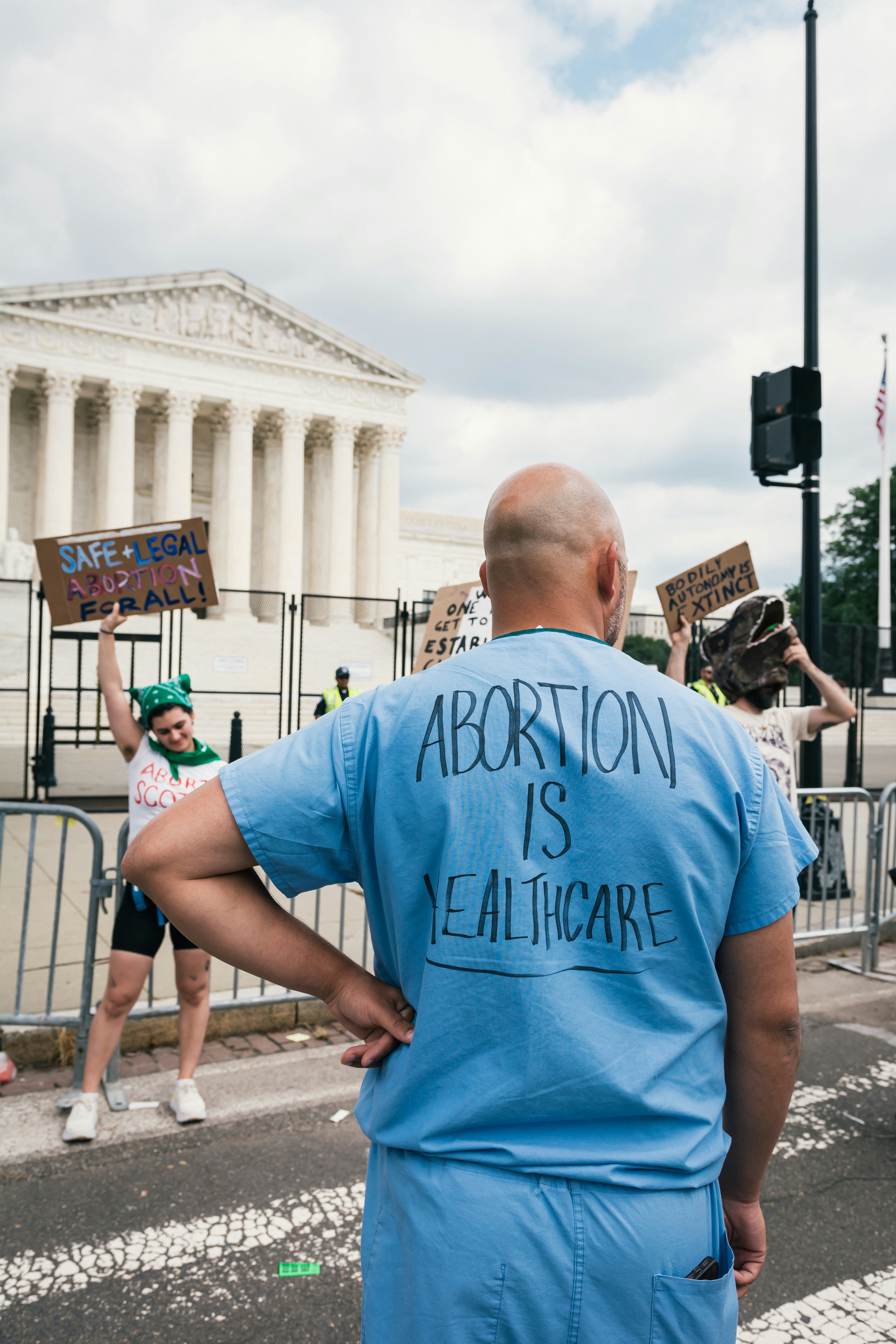 a man holding a sign