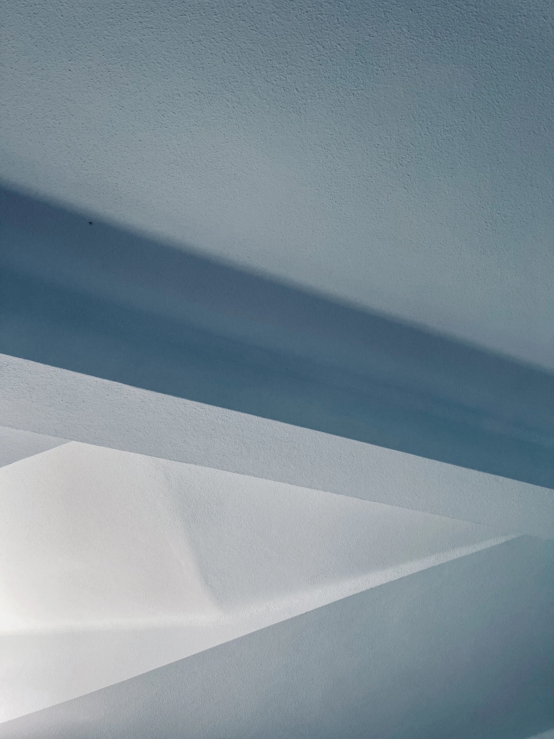 woman wearing yellow long-sleeved dress under white clouds and blue sky during daytime