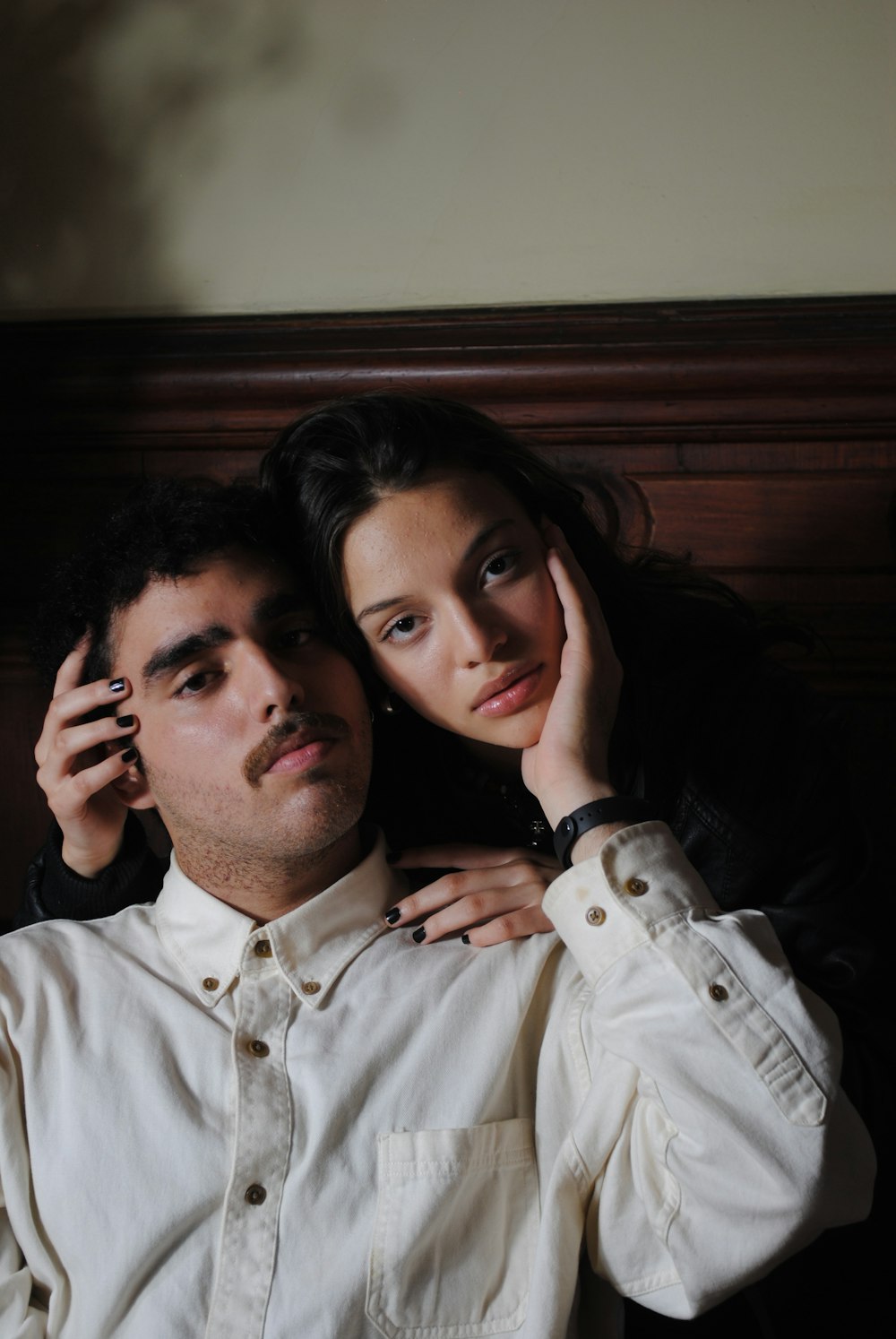 a man and woman taking a selfie