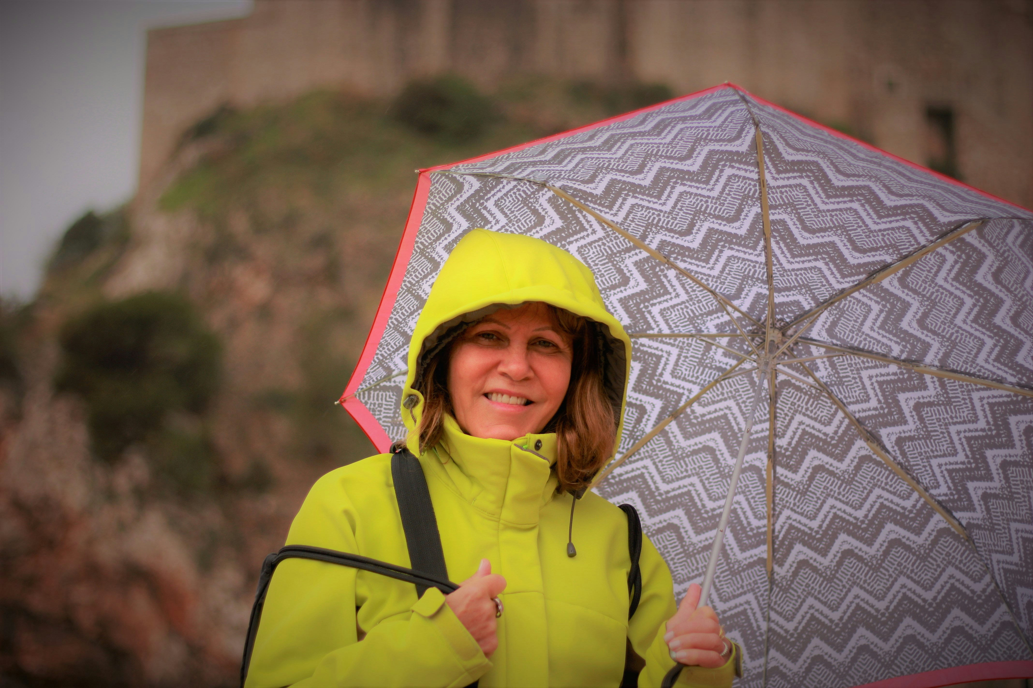 A woman holding an umbrella
