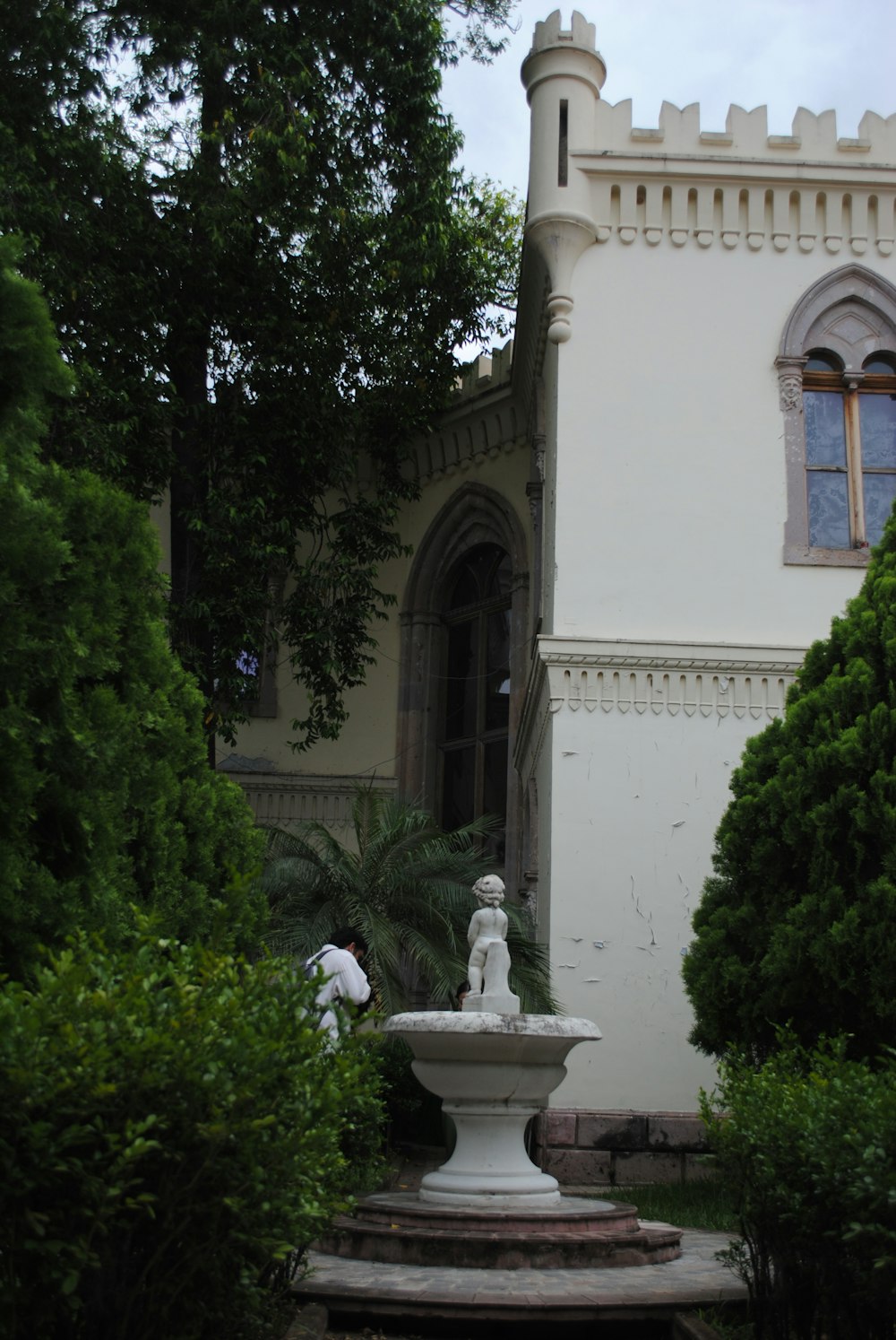 a fountain in front of a building