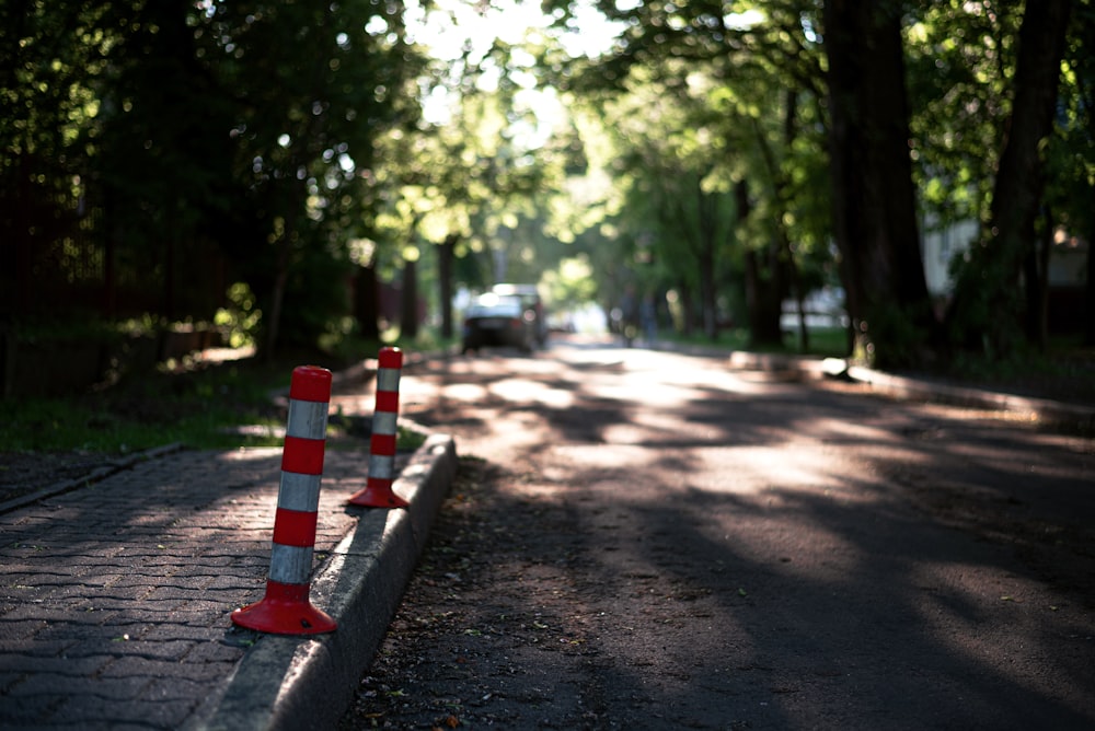 a road with cones on the side