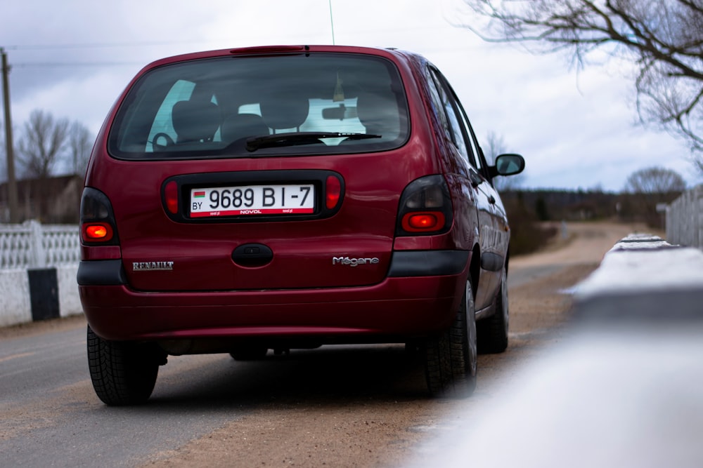 a red car on a road