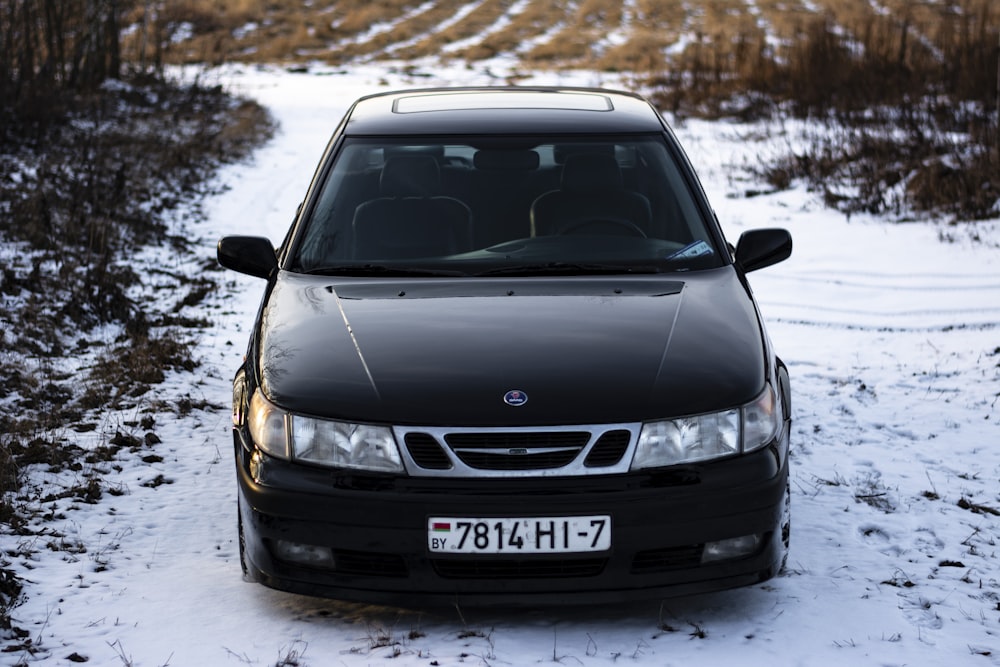 a car parked in the snow