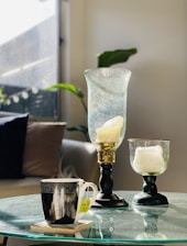 A cozy scene showing a pair of steffon slippers by a sunny window with a cup of tea nearby.