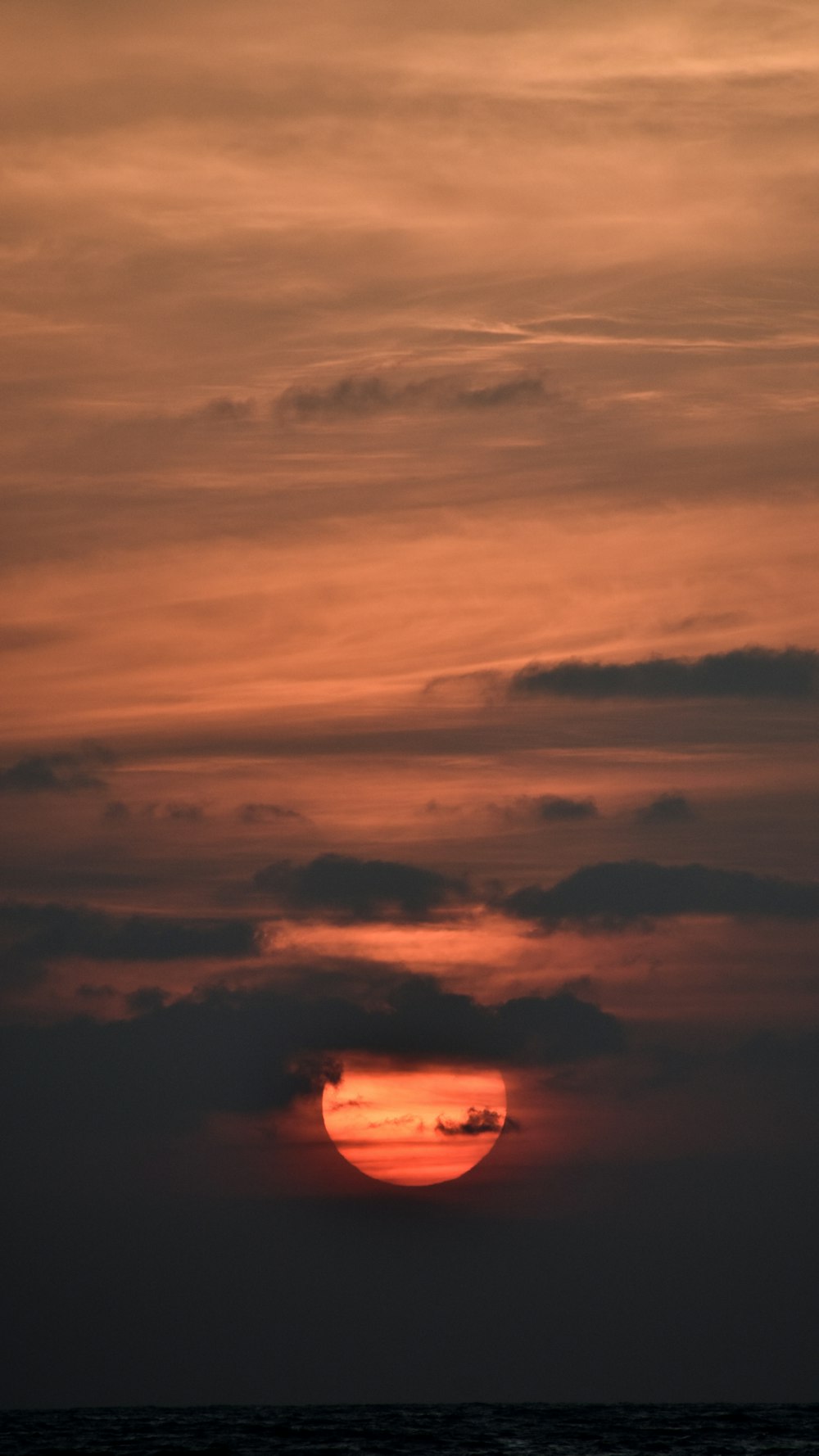 a sunset with clouds