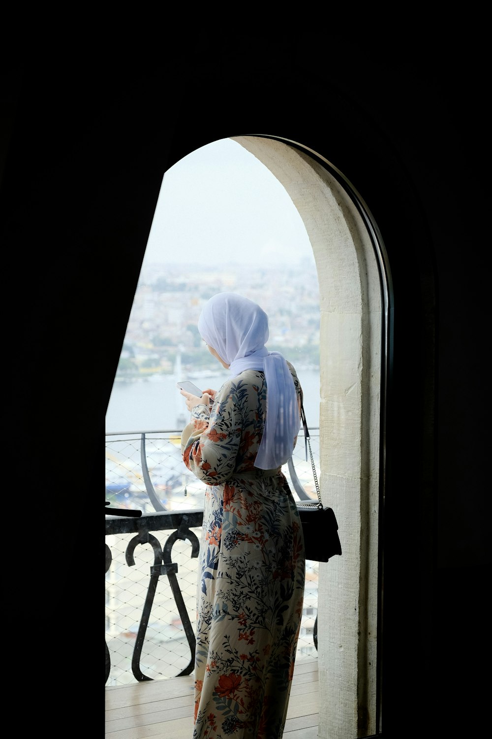 a person looking out a window