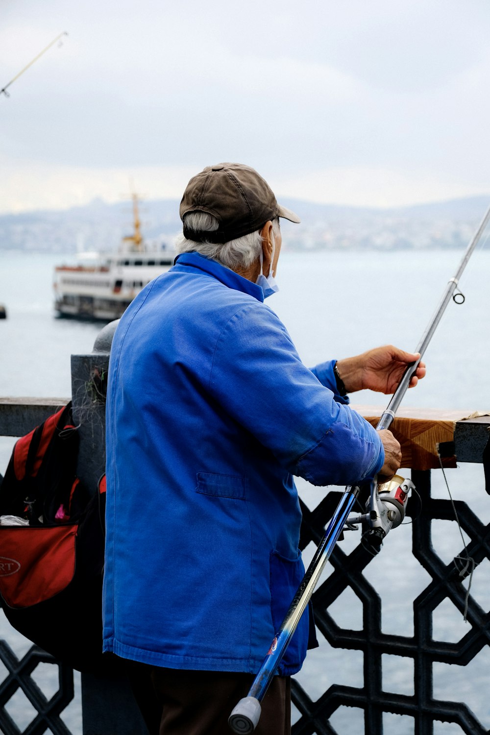 a person holding a fishing pole