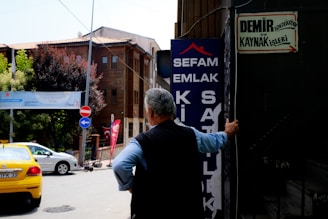 a person holding a sign