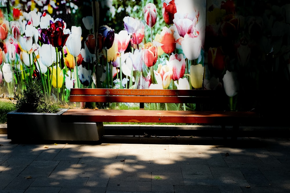 a bench with flowers on it