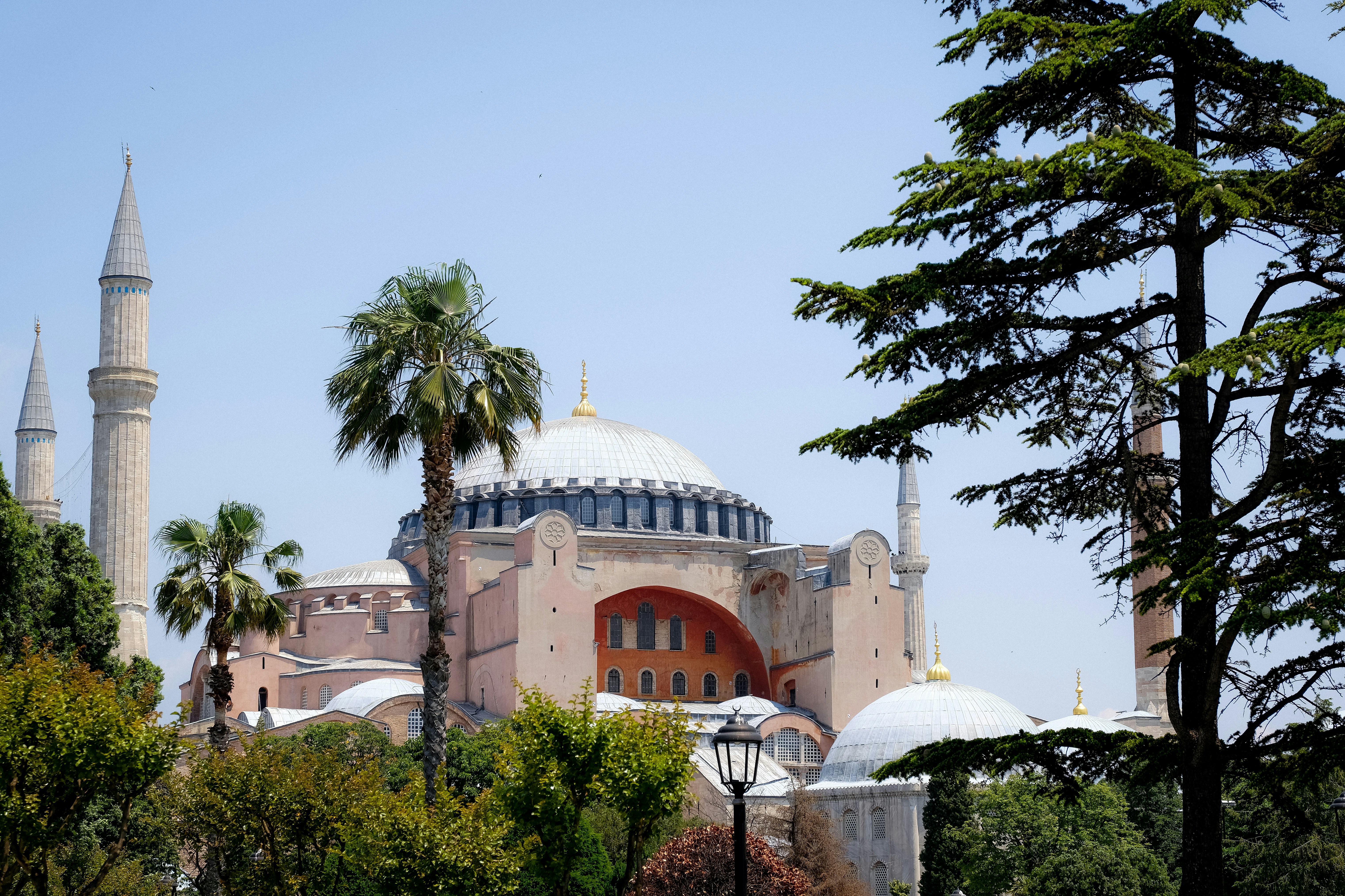 a large building with a dome and towers