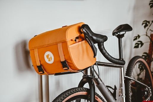 a bicycle with a bag on the back