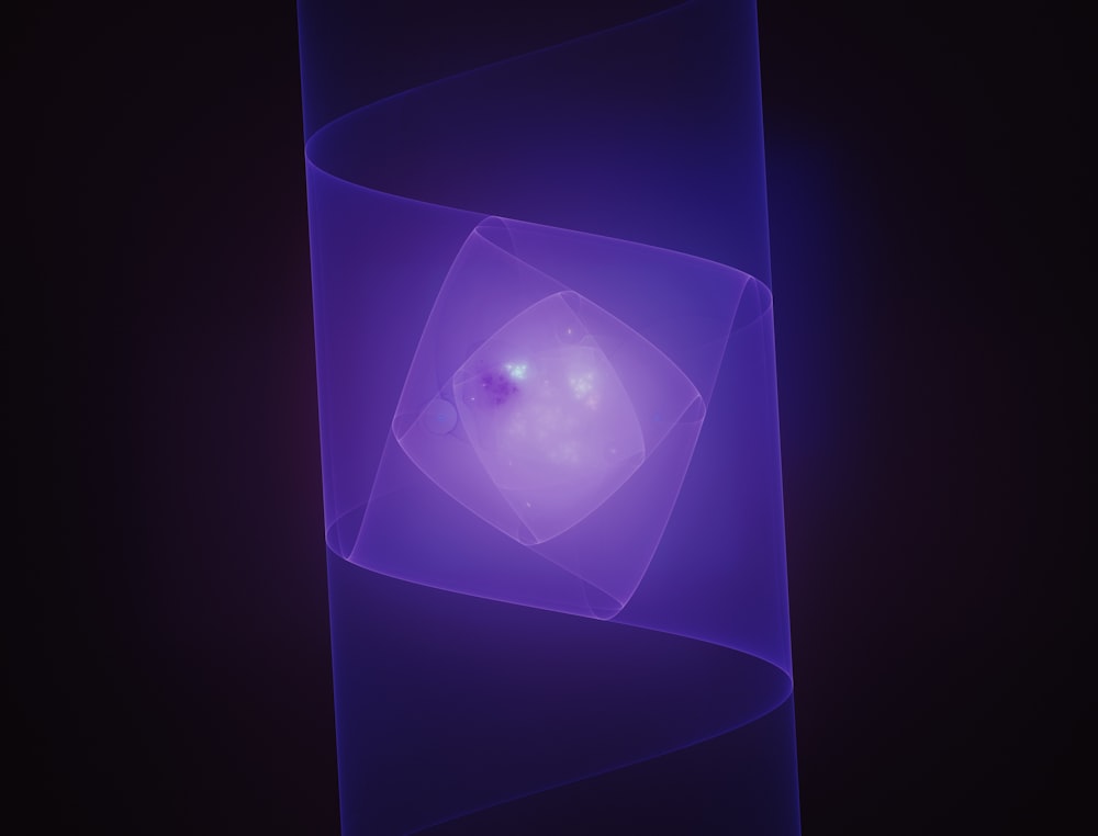 a purple light in a dark room