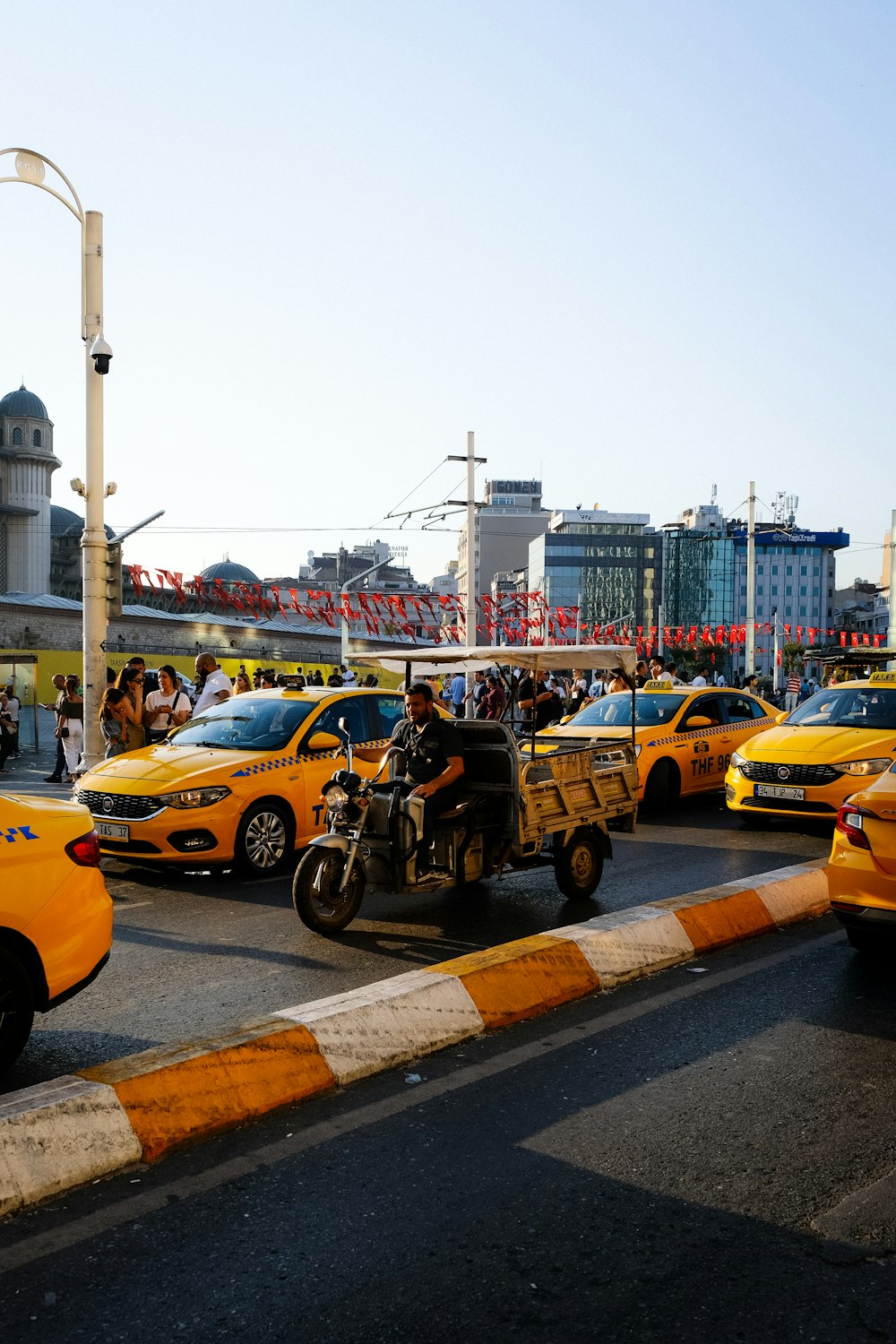 a person on a motorcycle in a busy street