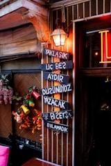 Elegant photo bar setup with cozy fall-themed decorations and lighting.