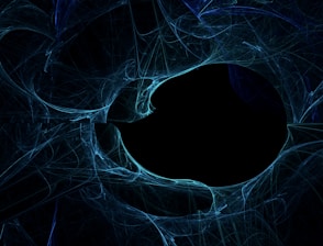 A mesmerizing abstract design featuring swirling blue lines and shapes converging around a dark, central void. The intricate patterns and textures suggest a sense of movement and depth, evoking a mixture of chaos and symmetry.