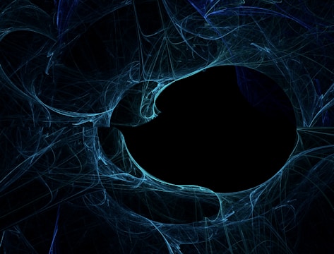 A mesmerizing abstract design featuring swirling blue lines and shapes converging around a dark, central void. The intricate patterns and textures suggest a sense of movement and depth, evoking a mixture of chaos and symmetry.