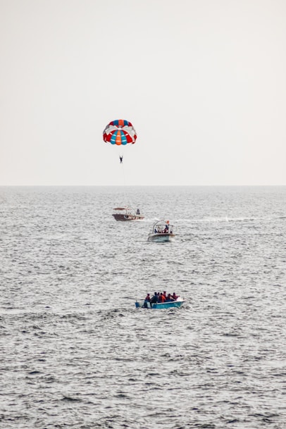 a person parasailing on a boat