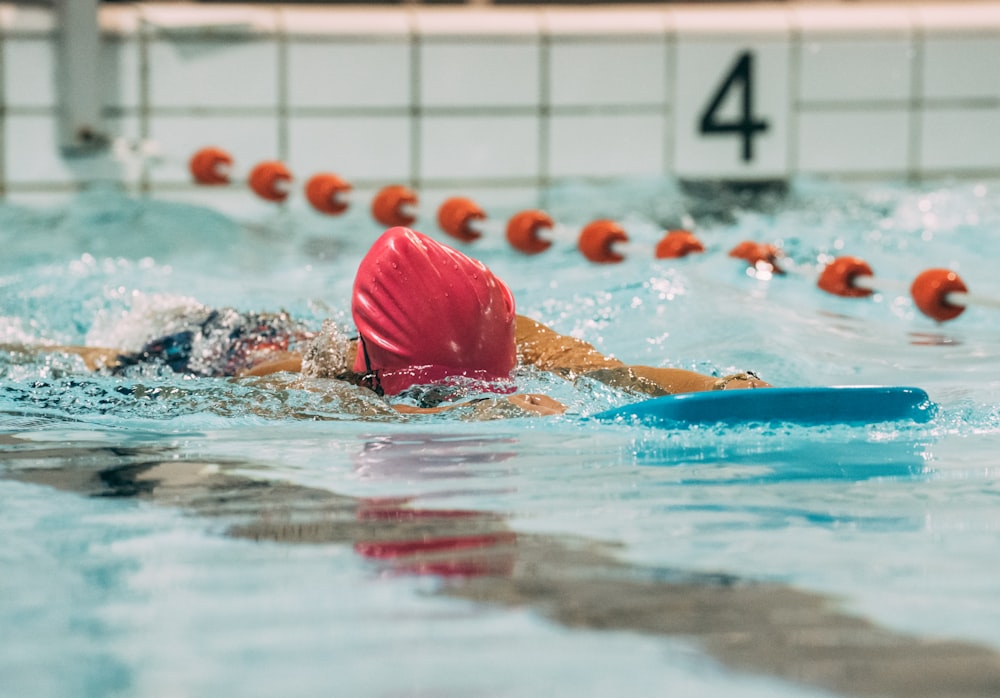 a person swimming in a pool