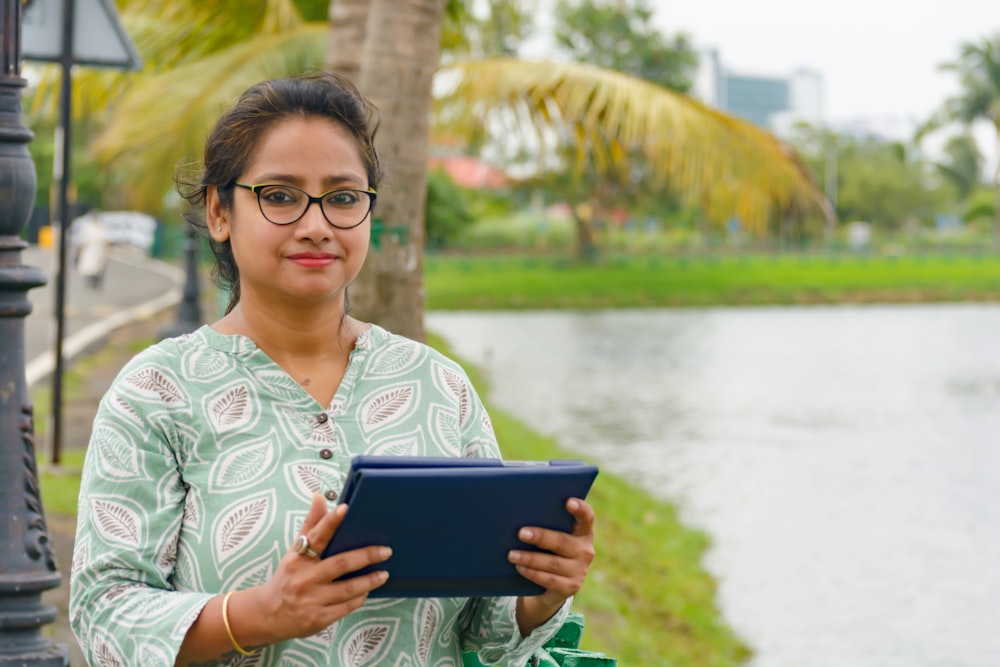 a person holding a tablet