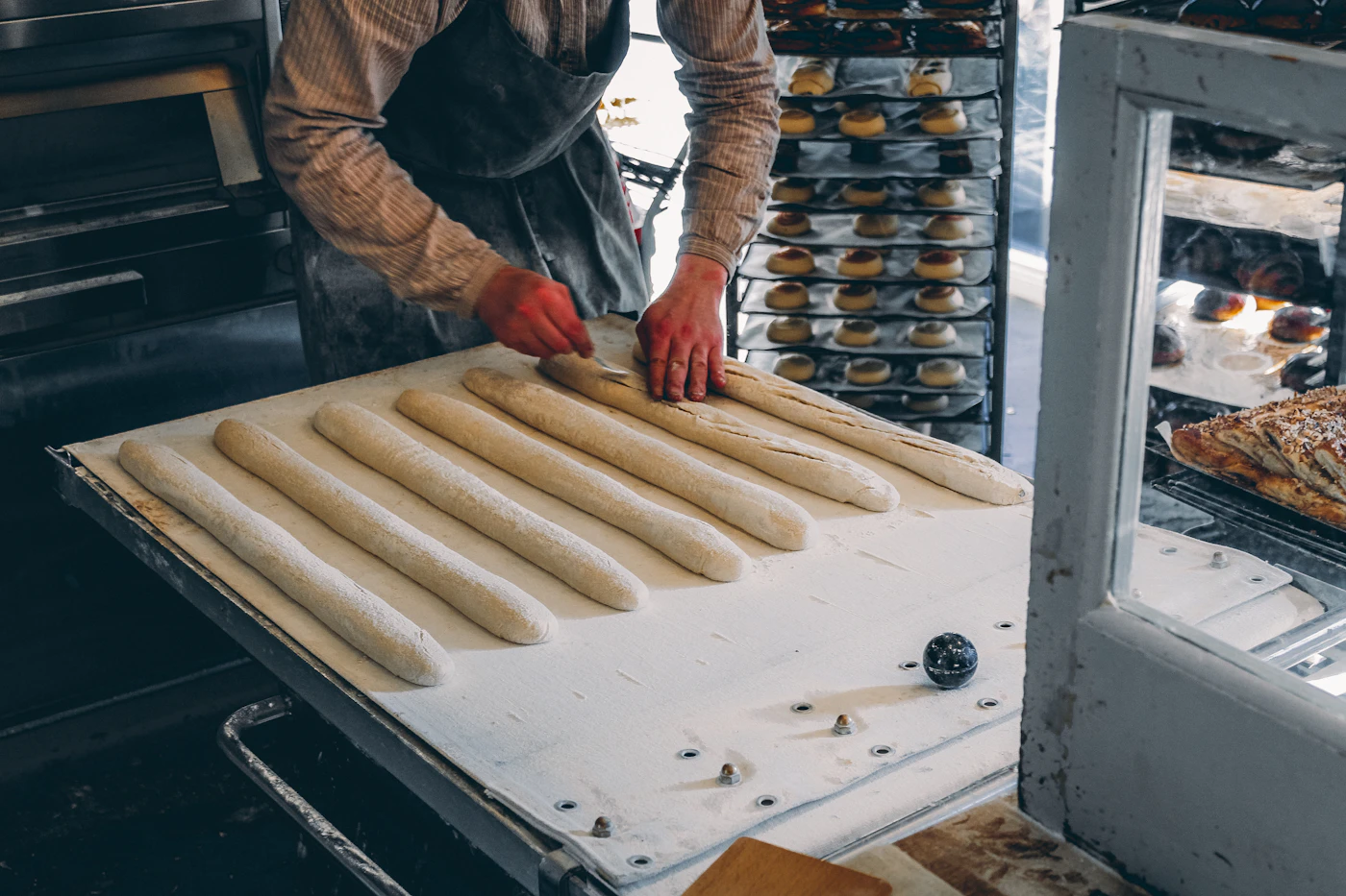 Person making donuts